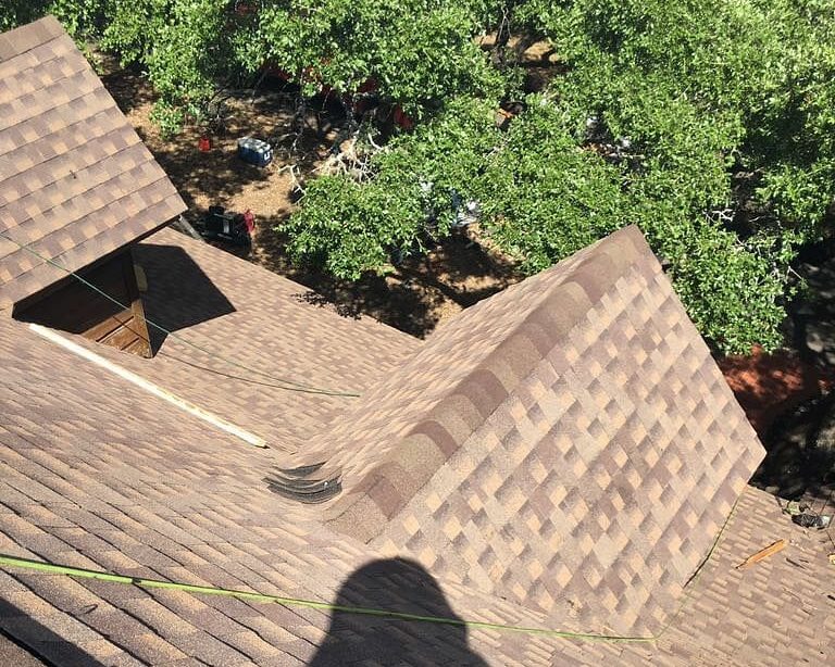Shingle roof installation in Austin, Texas.