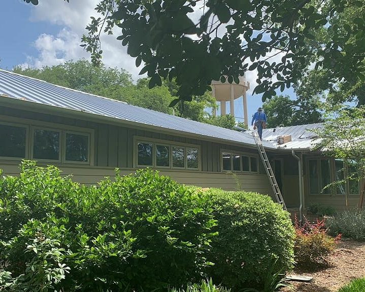 A&W contractor walking on the roof of a home in Austin, Texas.