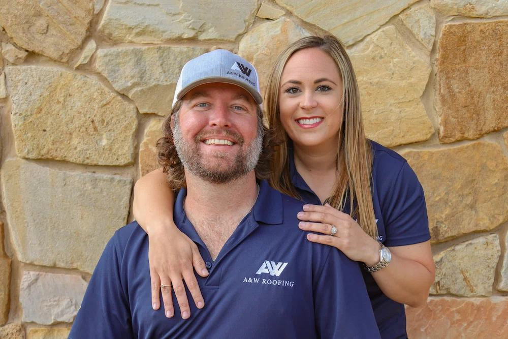 Ashley and Wesley, Owners of A&W Roofing smiling together.
