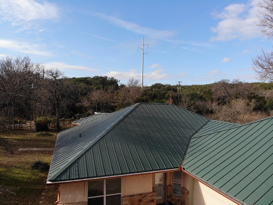 Metal roof in Burnet installed by the GAF-certified contractors at A&W Roofing Company.