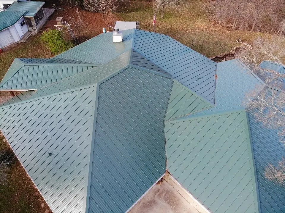 Installation of new metal roof on a home in Burnet, Texas.