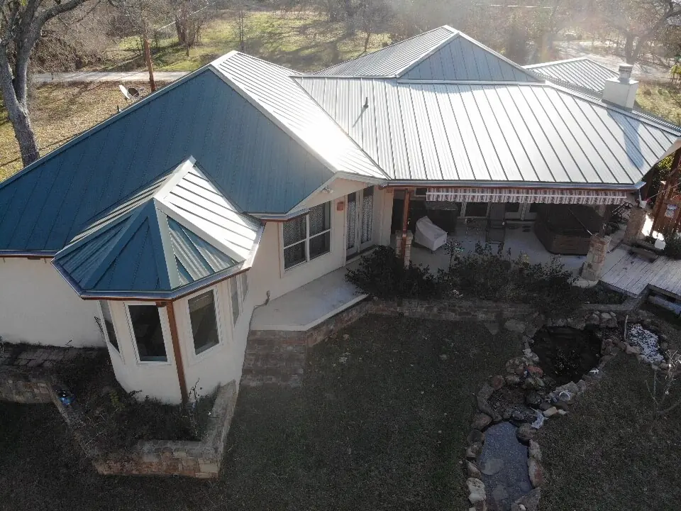 Metal roof in Burnet, Texas. The roof is green.