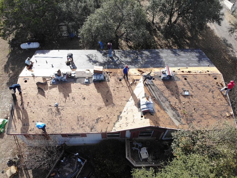 Liberty Hill roof contractors working to install a new roof.