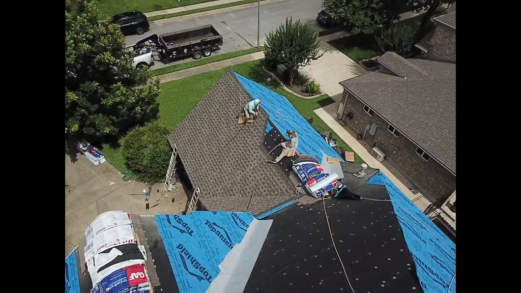 A&W contractors working on replacing a roof in Pflugerville.