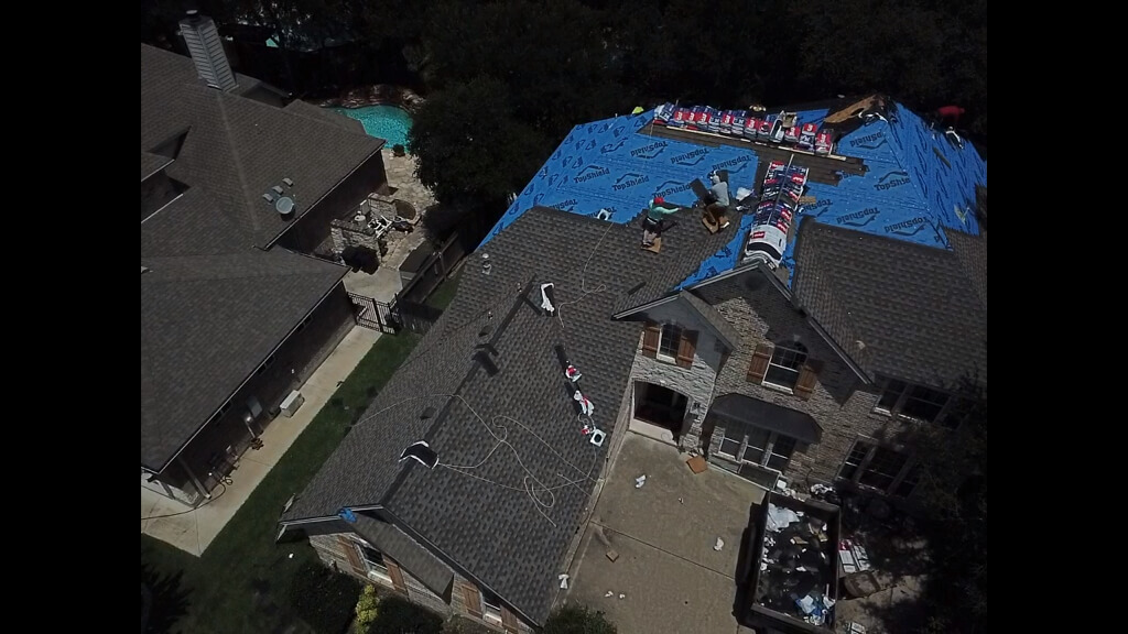 Home in Pflugerville, Texas undergoing new roof installation by a roofing company called A&W.