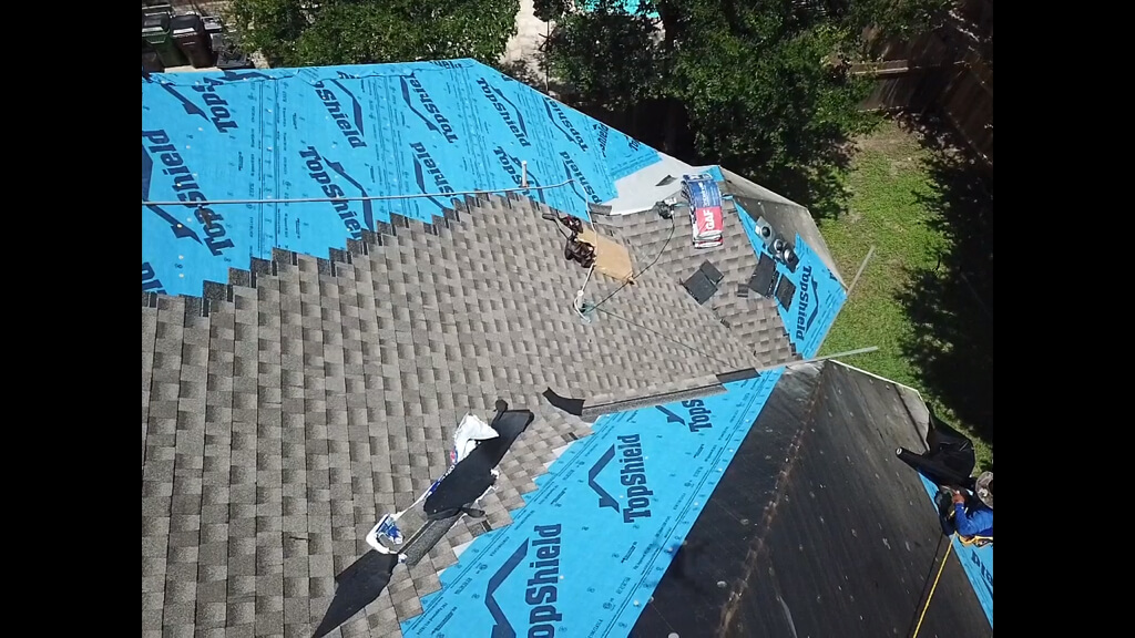 New roof installation with new shingles on Pflugerville home.