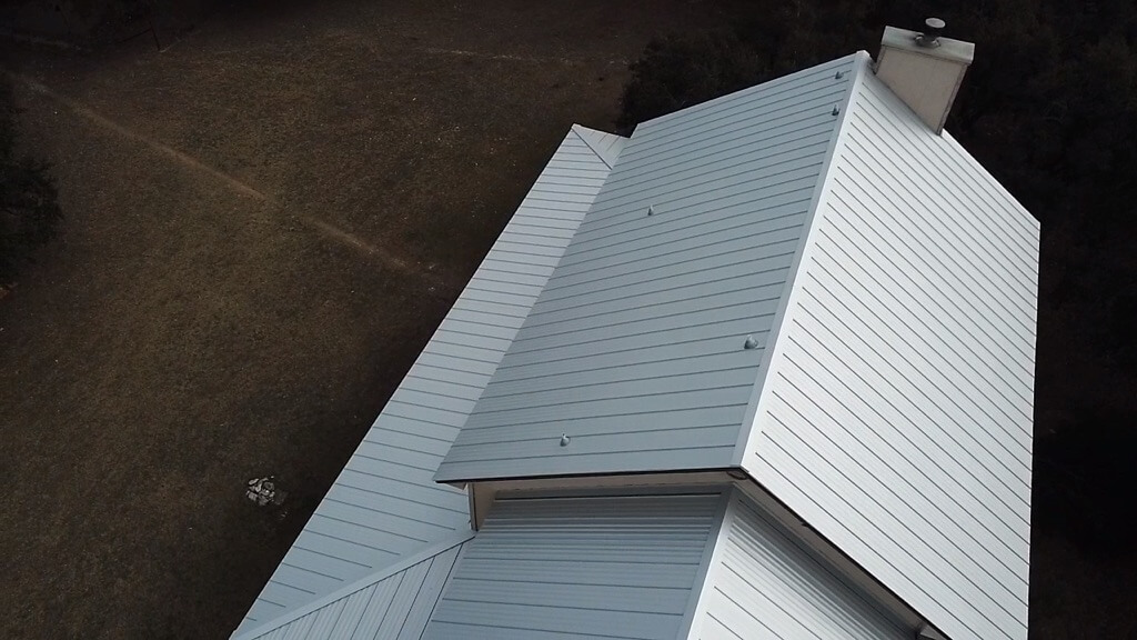Liberty Hill metal roof on a residential home with several levels.