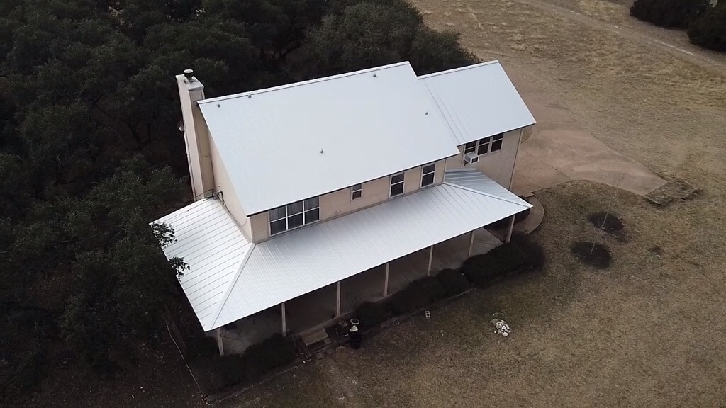 Metallic white metal roof in Liberty Hill, Texas.