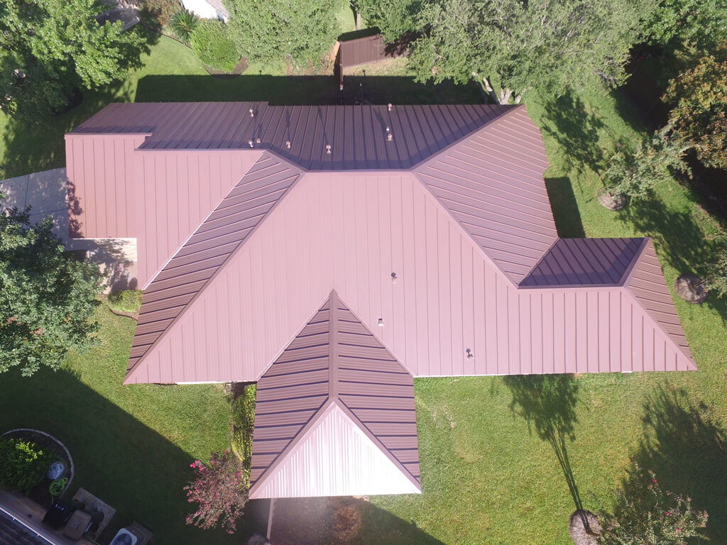 Red metal roof on Georgetown home from a birds eye view.